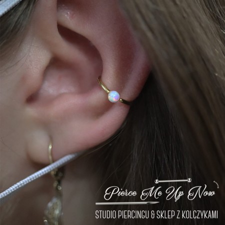 piercing-poznan-wygojony-conch-orbital.jpg