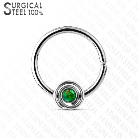 Rozginane kółeczko 10 mm ze zielonym opalem otoczonym spiralą, idealne do septum i daith. Wykonane ze stali chirurgicznej 316L. Należy delikatnie rozgiąć i zagiąć po założeniu.