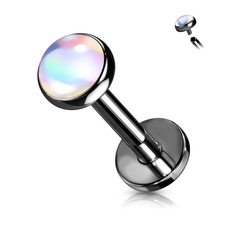 Czarny labret z białym opalizującym kamieniem Iridescent Stone, mieniącym się kolorowymi odblaskami. Dostępny w długościach 6 i 8 mm. Idealny do ucha i wargi. Stal chirurgiczna 316L z powłoką PVD.