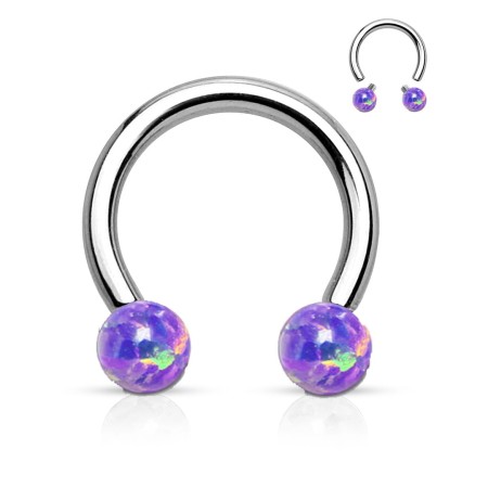 Podkówka z fioletowymi opalami o średnicy 3 mm. Wykonana ze stali chirurgicznej 316L, z gwintem wewnętrznym zapewniającym pewne trzymanie kulek. Idealna do różnych przekłuć.