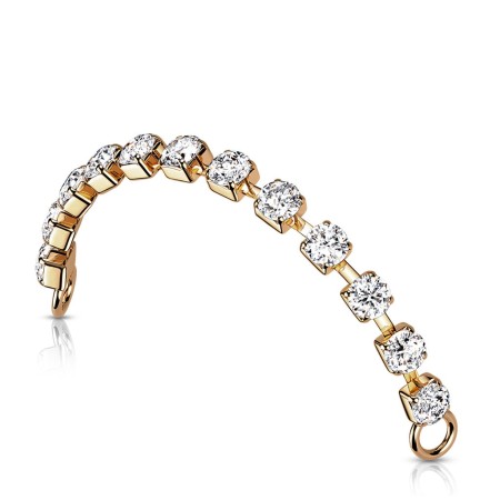 Łańcuszek do piercingu nosa w kolorze różowego złota z białymi kryształkami. Szerokość 2 mm, otwór łącznika 1,8 mm. Idealny do połączenia dwóch nostrili. Wykonany z mosiądzu.