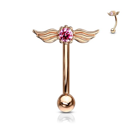 Banan rose gold z ozdobą w postaci skrzydełek i różową cyrkonią między nimi. Wykonany ze stali chirurgicznej 316L i mosiądzu. Typ gwintu: zewnętrzny.