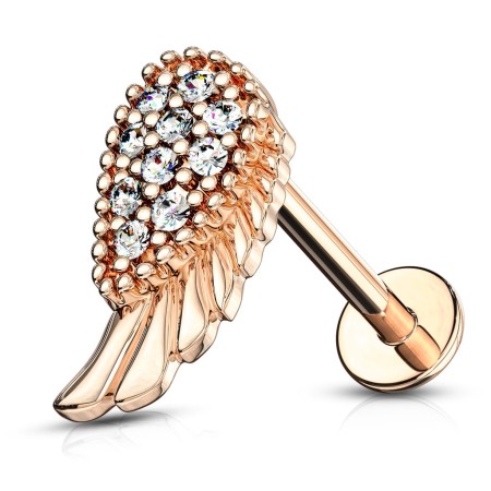 Labret skrzydło anioła w różowym złocie z białymi kryształkami. Nakrętka na gwint wewnętrzny. Idealny do piercingu lobe, helix, tragus, conch. Pręt ze stali chirurgicznej 316L, nakrętka z mosiądzu pokryta 14K złotem.