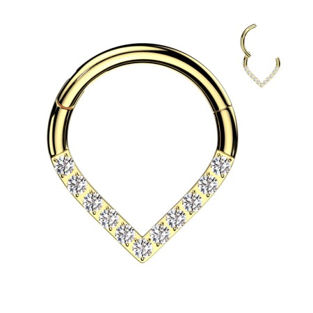 Kółeczko Clicker o trójkątnym zakończeniu. Kolczyk ozdobiony jest rzędem cyrkonii (Cubic Zircon) w owalnym, wydłużonym kształcie, które przyciąga wzrok swoim diamentowym błyskiem