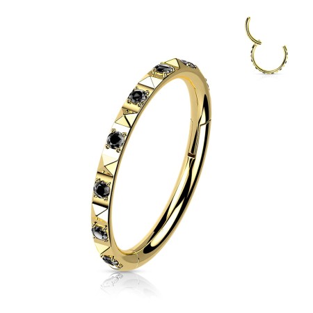 Złoty clicker z czarnymi cyrkoniami, wykonany z tytanu chirurgicznego z trwałą powłoką PVD. Hipoalergiczny, idealny do concha, helixa i lobe. Elegancki, subtelny i odporny na zarysowania.