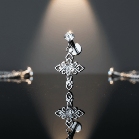 Kolczyk labret Cross Dangle z 3 mm białą cyrkonią i zawieszką w kształcie krzyżyka z kryształkami.