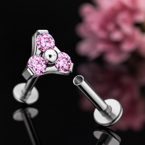 Przejdź do produktu Tytanowy labret trinity z 3  różowymi kryształkami