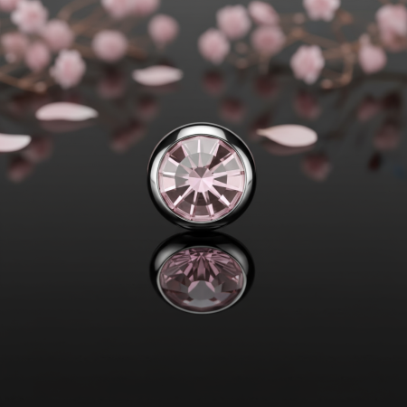 Tytanowy dysk do microdermala z różową cyrkonią to subtelna i elegancka biżuteria.