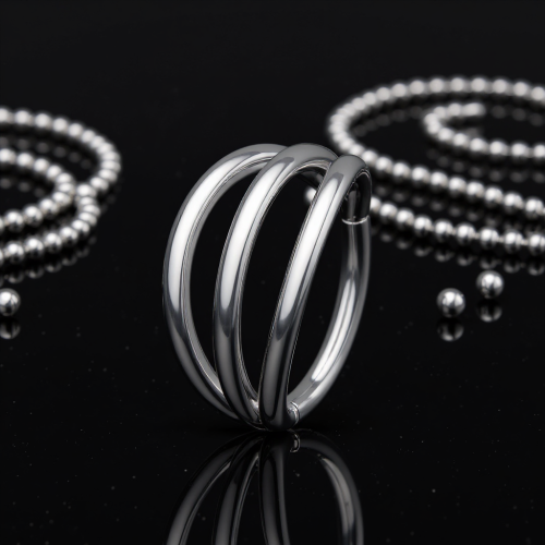 Przejdź do produktu Stalowe kółeczko clicker z trzema obręczami