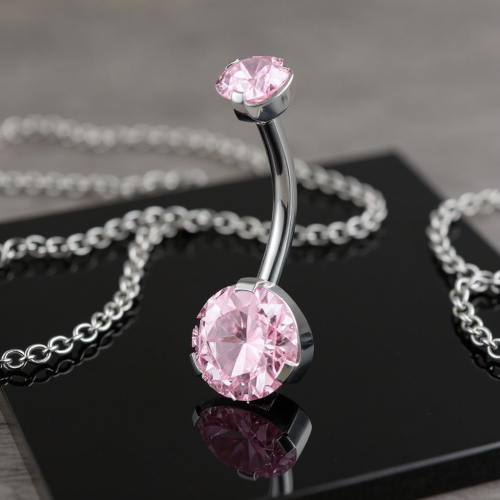 Przejdź do produktu Kolczyk do pępka z  pudrowo-różowymi cyrkoniami kubicznymi