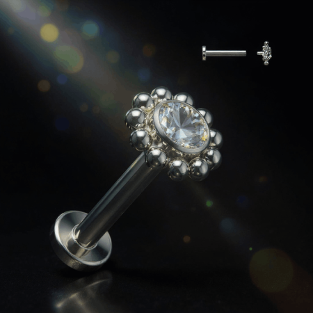 Tytanowy cluster Satelite Flower z białą cyrkonią i malutkimi kuleczkami.