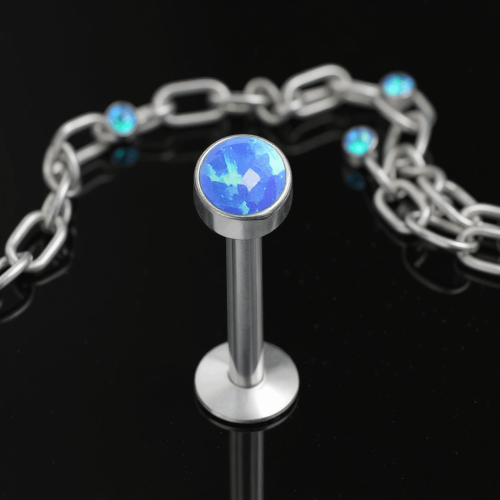 Przejdź do produktu Tytanowy labret z niebieskim opalem