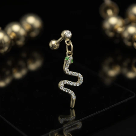 Sztanga ze złotym kryształowym wężem – białe cyrkonie zamiast łusek, zielone oczy.