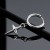 Kolczyk Huggie Star Cross Dangle – stal chirurgiczna 316L