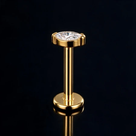 Złoty tytanowy labret z łezką i białą cyrkonią