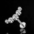 Cluster labret z 5 białymi cyrkoniami o różnych rozmiarach (od 4 mm do 2 mm), ułożonymi w symetryczny łuk.