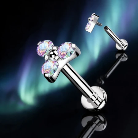 Elegancki labret tytanowy Trinity z trzema cyrkoniami w kolorze Aurora Borealis zachwyca wielowymiarowym blaskiem inspirowanym barwami zorzy polarnej.