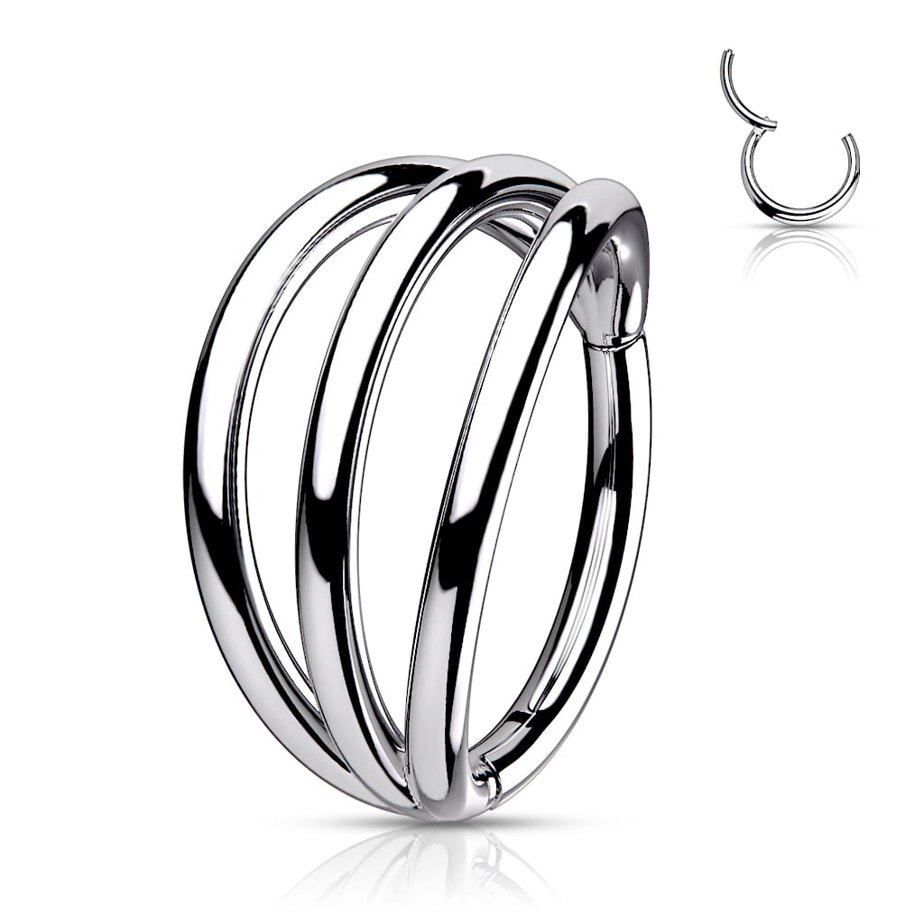 Tytanowy clicker z trzema obręczami, idealny do piercingu conch, helix i lobe. Wygodne zapięcie na klik ułatwia zakładanie. Wykonany z tytanu chirurgicznego TITANIUM ASTM F-136 – lekki, trwały i bezpieczny.