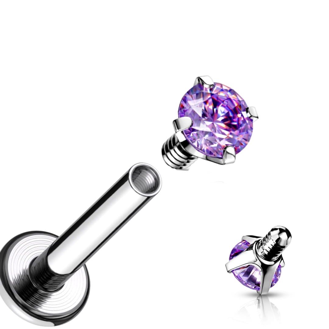 Labret z fioletową cyrkonią 3D o średnicy 4 mm, wykonany ze stali chirurgicznej 316L z wewnętrznym gwintem. Idealny do różnych piercingów: lobe, helix, tragus, conch i wargi. Elegancja i komfort noszenia w jednym.