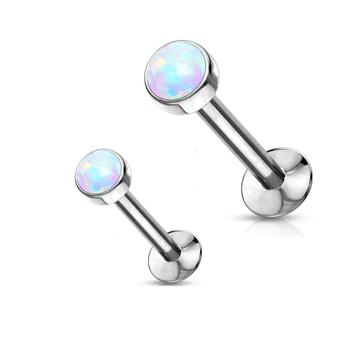 Tytanowy labret z białym opalem, gwint wewnętrzny, wykonany z tytanu G23. Nakrętka dostępna w rozmiarach 3 lub 4 mm. Idealny na świeże przekłucia i dla alergików. Pasuje do helix, lobe, conch oraz piercingu wargi.